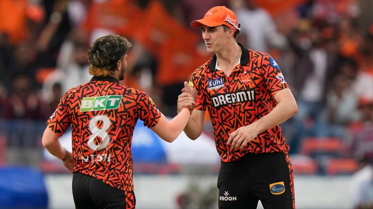 Sunrisers Hyderabad's Nitish Kumar Reddy and captain Pat Cummins celebrates the run out of Punjab Kings' Shashank Singh