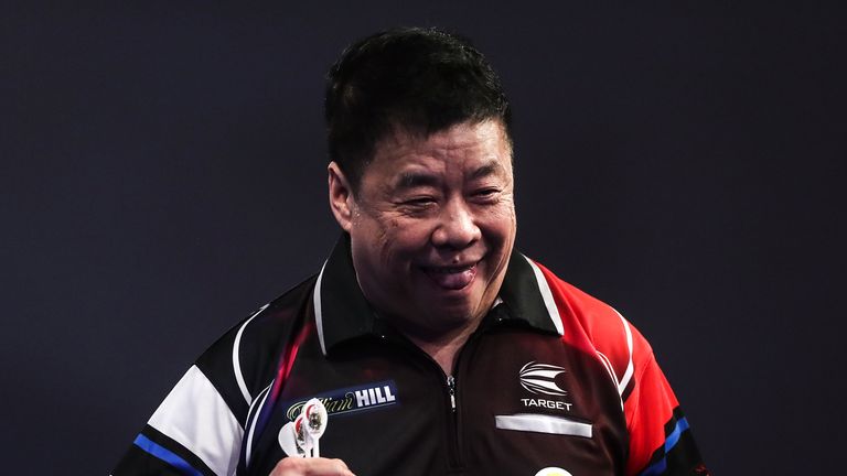 Paul Lim celebrates after winning his match against Luke Humphries during day four of the William Hill World Darts Championship at Alexandra Palace, London.