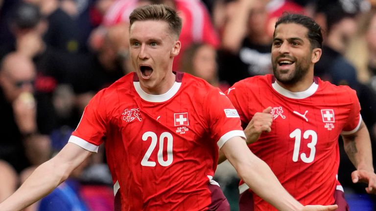 Michel Aebischer celebrates after scoring Switzerland's second goal against Hungary