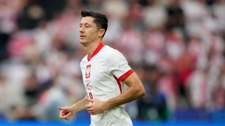 Poland's Robert Lewandowski enters the pitch 