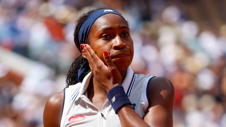 Coco Gauff of the U.S. walks to the baseline during her semifinal match of the French Open tennis tournament against Poland's Iga Swiatek at the Roland Garros stadium in Paris, Thursday, June 6, 2024. (AP Photo/Jean-Francois Badias)