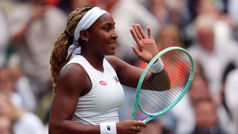 Coco Gauff celebrates beating Caroline Dolehide on day one of Wimbledon