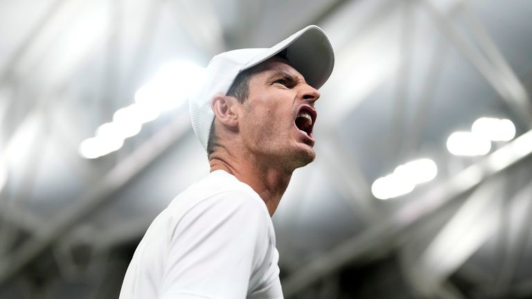 Britain's Andy Murray celebrates after winning the second set against Stefanos Tsitsipas of Greece in a men's singles match on day four of the Wimbledon tennis championships in London, Thursday, July 6, 2023. (AP Photo/Kirsty Wigglesworth)