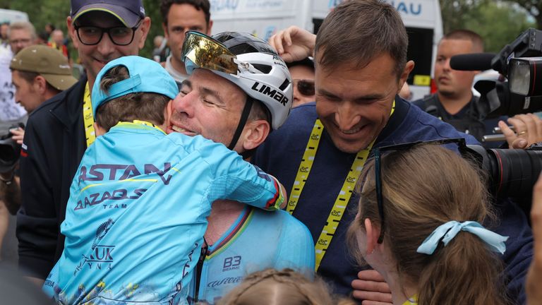 Britain's sprinter Mark Cavendish celebrates after winning a record 35th Tour de France stage win to break the record of Belgian legend Eddy Merckx during during the fifth stage of the Tour de France cycling race over 177.4 kilometers (110.2 miles) with start in Saint-Jean-de-Maurienne and finish in Saint-Vulbas, France, Wednesday, July 3, 2024. (Thomas Samson/Pool Photo via AP)