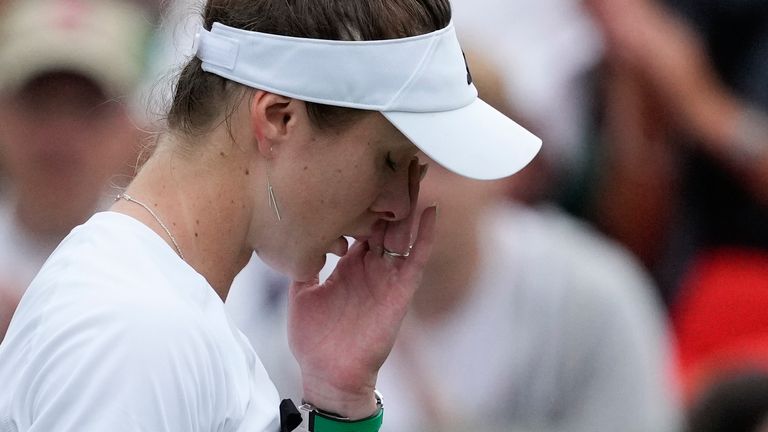 Elina Svitolina of Ukraine reacts after defeating Xinyu Wang of China in their fourth round match at the Wimbledon tennis championships in London, Monday, July 8, 2024. (AP Photo/Mosa'ab Elshamy)