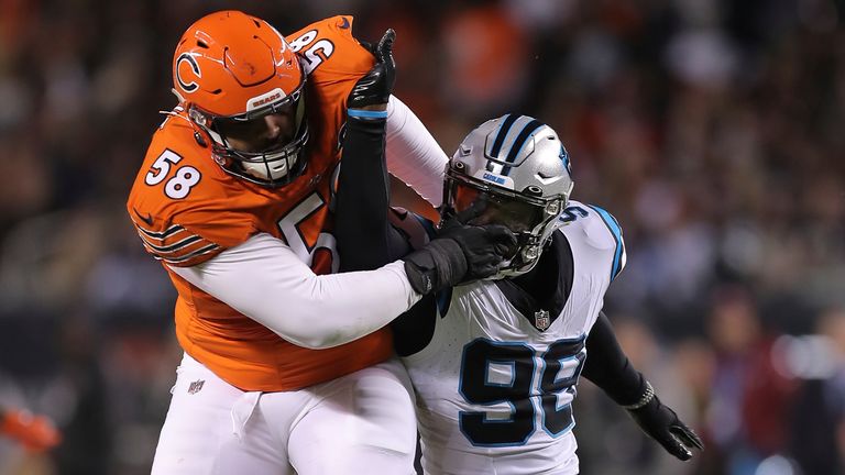 Chicago Bears offensive tackle Darnell Wright (58) guards Carolina Panthers linebacker Marquis Haynes Sr. (98) during an NFL football game, Thursday, Nov. 09, 2023, in Chicago. (AP Photo/Melissa Tamez)